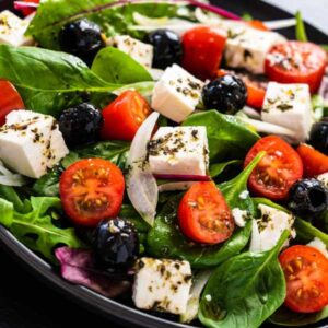Fresh greek salad - feta cheese, tomato, lettuce, black olives a